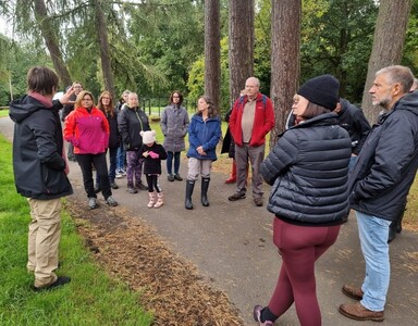 Anna talking to the group in the park