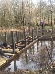 Decking being added over the composite subframe