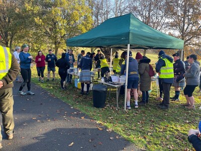 Manning a sales stall at a ParkRun event