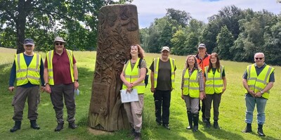The search team at the carving celebrating the  Greater Butterfly Orchid