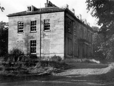 View of the derelict house in 1972 with windows and roof apparently intact