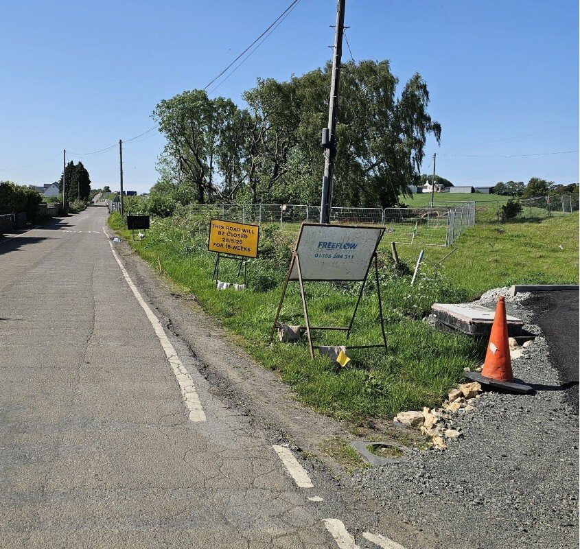 View of Roman Road with sign showing road closure